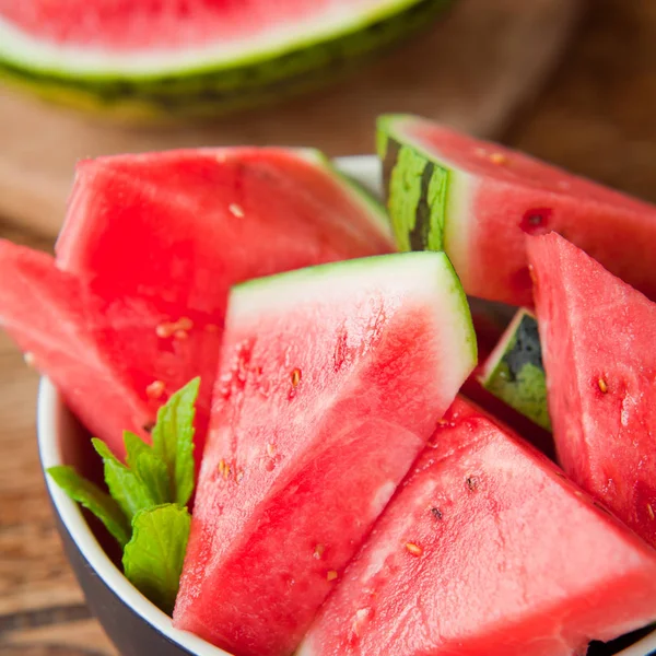 Closeup of sliced watermelons pattern, food background