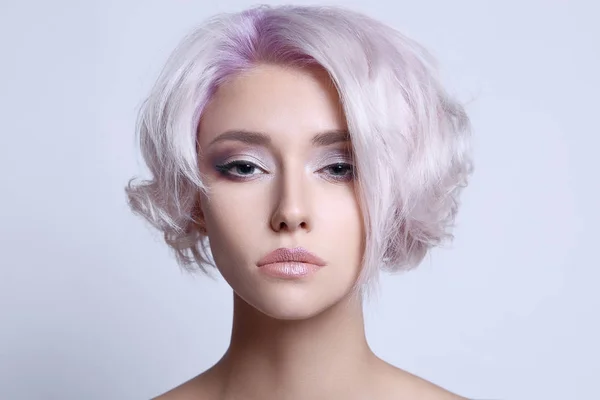 color hair beautiful young woman.sensual blond girl with haistyle and make-up