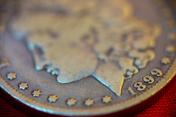 Liberty silver dollar minted in the year 1899.