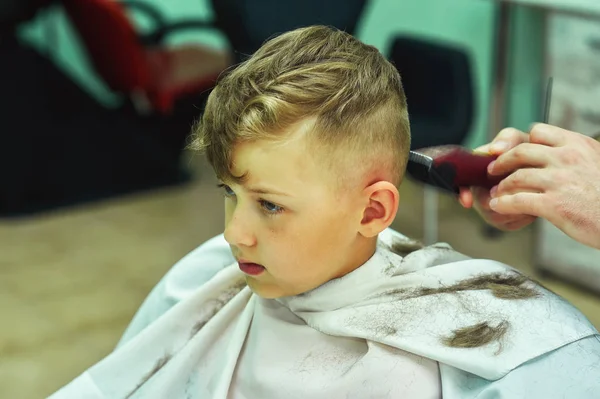 Men\'s Barber makes the cut boy in the cabin