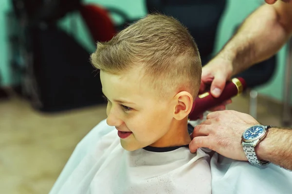 Men\'s Barber makes the cut boy in the cabin