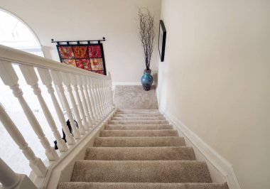 Descending Open Staircase with Carpeting clipart