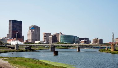 Dayton, Ohio - September 7, 2020: Skyline of Dayton, Ohio with Riverside Drive Bridge in foreground over the Great Miami River.  clipart