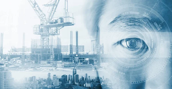Double exposure, eye with futuristic technology and buildings construction and cityscape. Artificial intelligence technology
