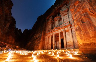 Petra by night, ancient architecture in canyon, Petra in Jordan. The rose city at night, famous travel destination in Middle-East, Jordan clipart