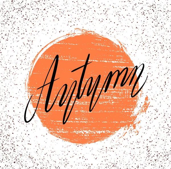 Lettering Autumn written by hand with grunge circle and spotted background. Calligraphic inscription. Vector element — Stock Vector