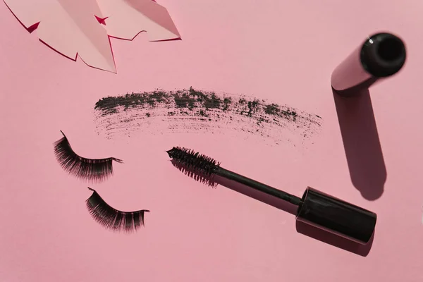 Black False Lashes Strips Mascara Pink Background Paper — Stock Photo, Image