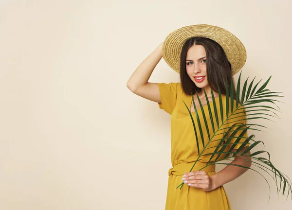 Young Attractive Woman Holding Palm Leaves Wearing Hat — Stock Photo, Image