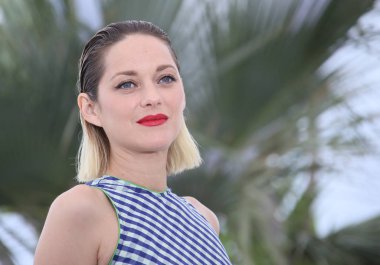 Marion Cotillard attends the photocall for 'Angel Face (Gueule D'Ange)' during the 71st annual Cannes Film Festival at Palais des Festivals on May 12, 2018 in Cannes, France.  clipart