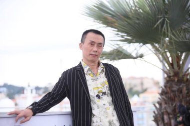 Aktör Yongzhong Chen photocall 71 yıllık Cannes Film Festivali sırasında Palais des Festivals üzerinde 16 Mayıs 2018 Fransa'nın Cannes ' Uzun Day's Journey içine Night için (Di Qui Zui Hou De Ye Wan)' katılır.