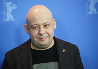Yönetmen Alexey Almanca pozlar de 'Dovlatov' fotoğraf arama sırasında 68 Berlinale Uluslararası Film Festivali Berlin Grand Hyatt Hotel'de üzerinde 17 Şubat 2018, Berlin, Almanya.