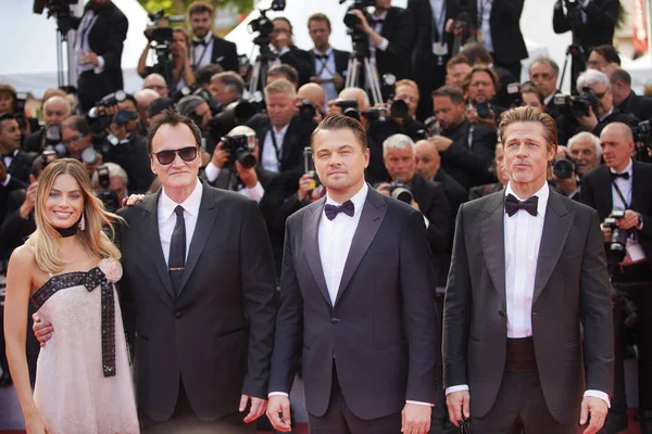 Margot Robbie, Quentin Tarantino og Leonardo DiCaprio - Stock-foto