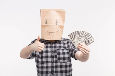 Men in happy paper bag mask with paper bills showing thumbs up on white background clipart