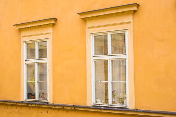 European yellow colorful house wall and windows. — Stock Photo, Image