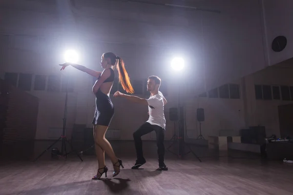 Young love couple dancing social danse kizomba or bachata.