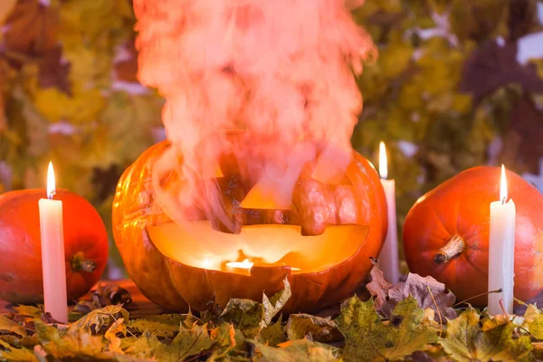 Jack-o-Lantern halloween pumpkin with mist pouring from its mouth