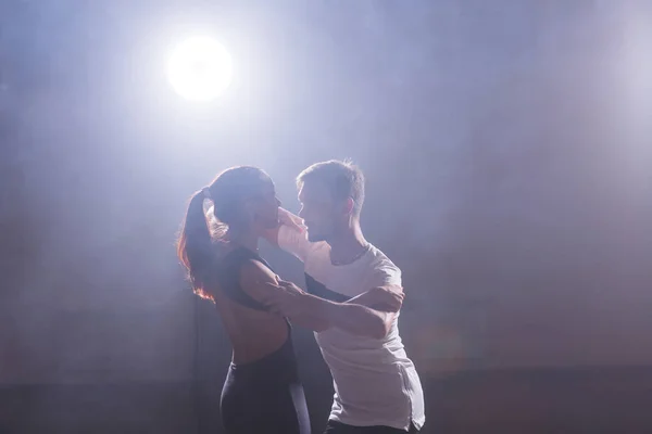 Young love couple dancing social danse kizomba or bachata.