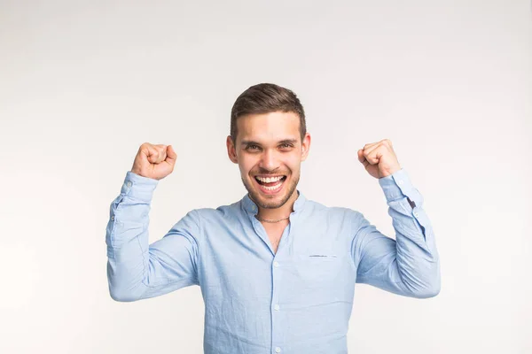 Happy Man With His Hands Up On White Background Stock Photo, Picture and  Royalty Free Image. Image 15812722.