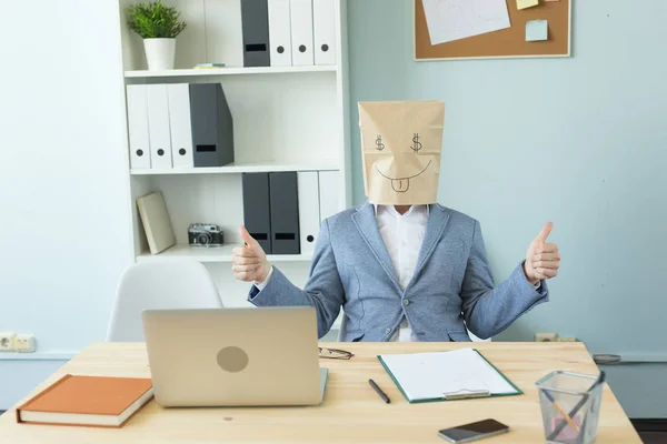 Business, emotions and money concept - office crazy man put a package with painted funny face on her head. Dollar sign in her eyes — Stock Photo, Image