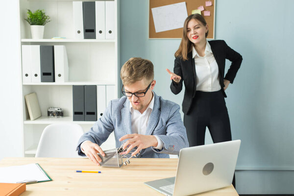 Business, emotions and people concept - Business woman shout at male worker in office place