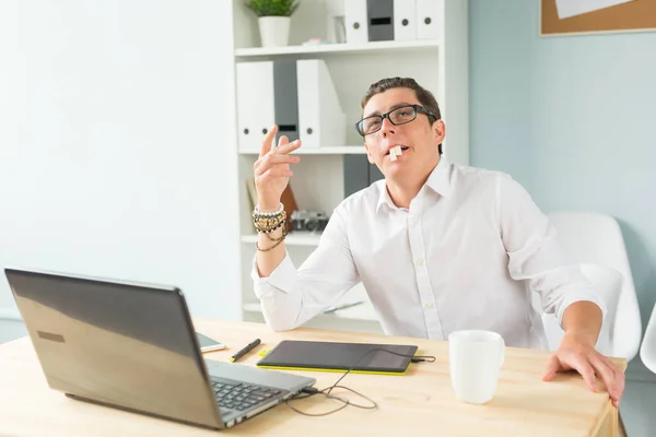 Business, humor and people concept - Young man in white shirt make funny face