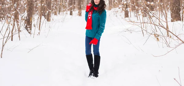 Close up of young woman walking in winter time. Pretty girl in snowy nature — Stock Photo, Image