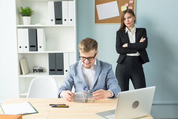 Business, emotions and people concept - Business woman shout at male worker in office place