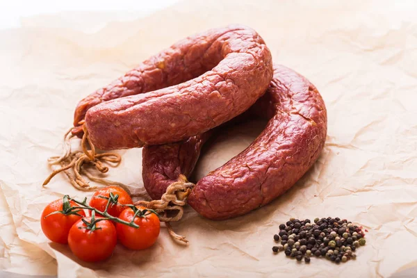 Food, national cuisine and delicious concept - sausages made with horse meat — Stock Photo, Image