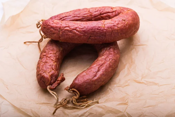 Food, national cuisine and delicious concept - sausages made with horse meat