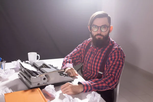 People, writer and hipster concept - young stylish writer working on typewriter — Stock Photo, Image