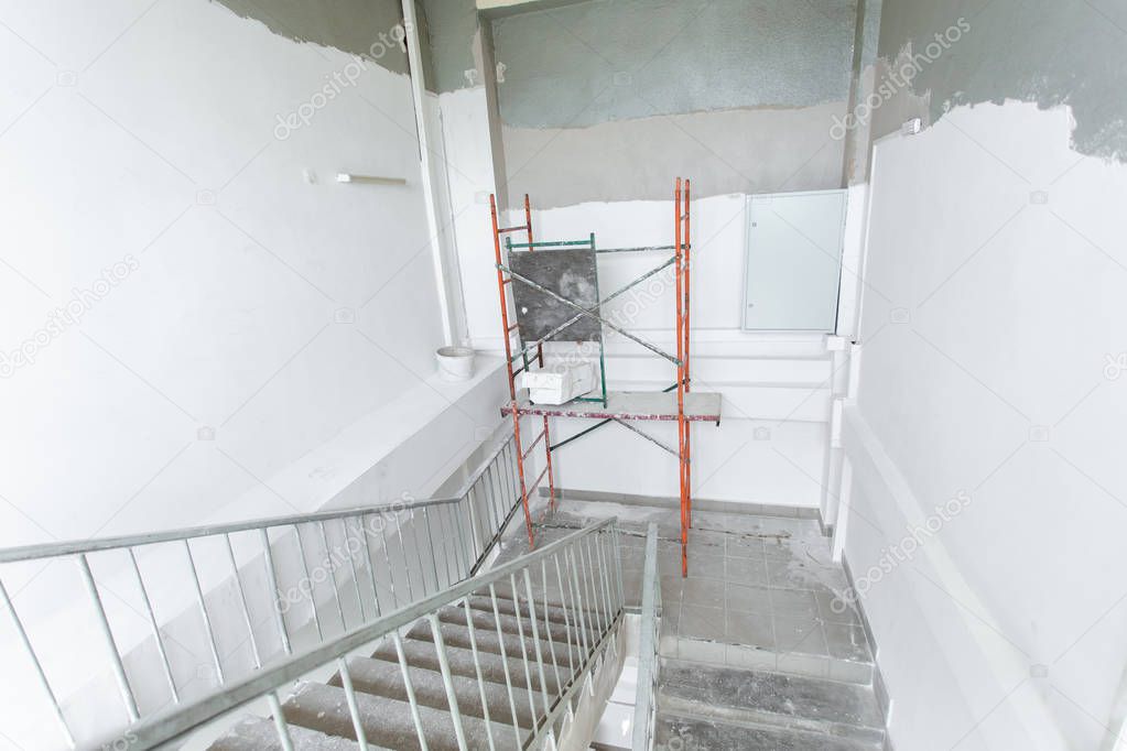 Room with ladders during under renovation, remodeling and construction