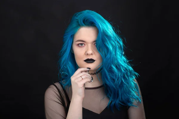 Sryle and fashion concept - Close up portrait of woman with blue long hair over black background — Stock Photo, Image