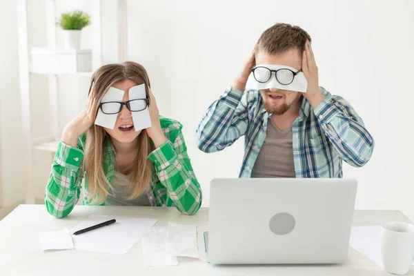 Husband and wife were upset because of numerous expenses on paying for housing and communal services and repairing the apartment covering their eyes with checks