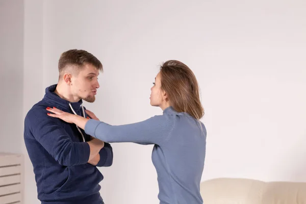 People, abuse and violence concept - agressive man strangling his wife — Stock Photo, Image