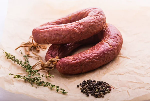 Food, national cuisine and delicious concept - sausages made with horse meat — Stock Photo, Image