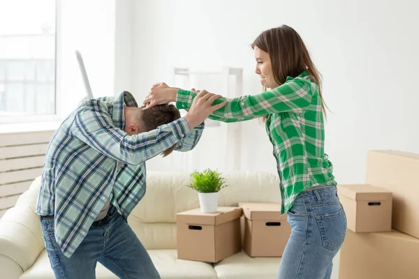 Negative emotions of couples, abuse and family fight concept. Husband and wife arguing and yelling expressive, beating each other and emotional couple having an argument or the quarrel at home