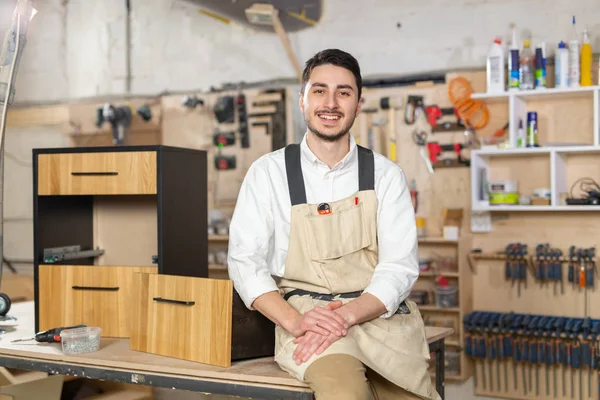 furniture factory, Small-Sized Companies and people concept - Portrait of a smiling male worker at manufacturing