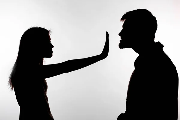 Man abusing woman, silhouette on a white background. Stop sexual assault — Stock Photo, Image