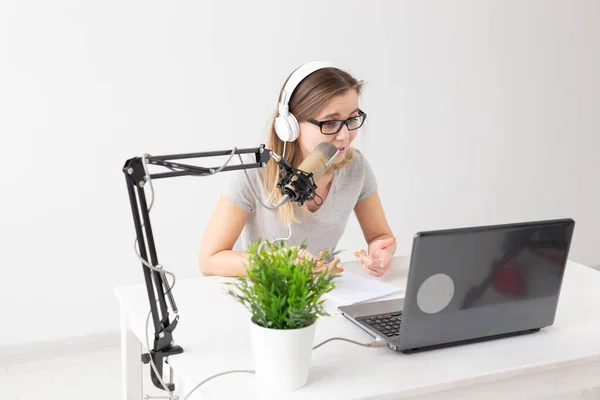 Radio, blogging, broadcast concept - woman dj is working on the radio — Stock Photo, Image