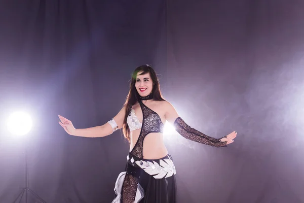 Belly dancer. Young attractive woman dancing tribal fusion on the stage. Oriental exotic dance. — Stock Photo, Image