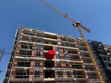 Vinçli inşaat alanı. Kentsel gelişim, mimari ve modern yapı gelişimi