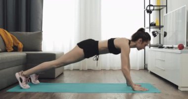 Young woman doing fitness workout for healthy lifestyle at home. Healthy and sport lifestyle.