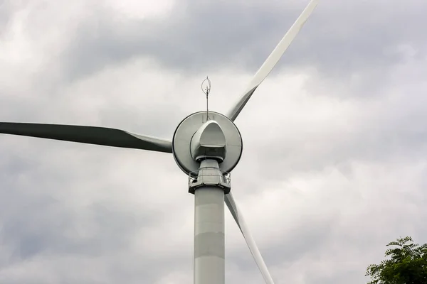 Close up of a wind turbine to understand an alternative energy