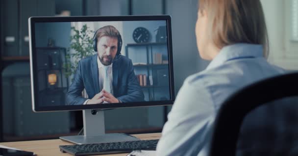 Business lady talking with colleague via video call on — Stock Video