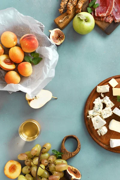 Top View Various Wine Snacks Blue Concrete Table — Stock Photo, Image