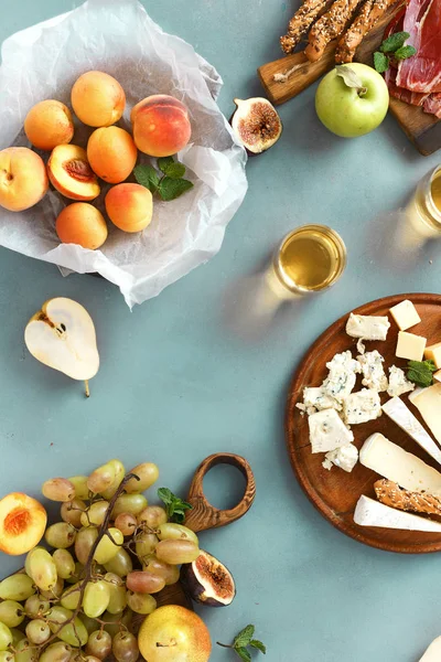 Top View Various Wine Snacks Blue Concrete Table — Stock Photo, Image