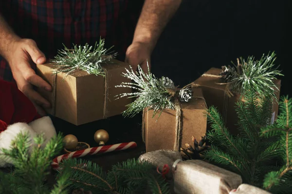 Male Hands Holding Christmas Gift Boxes Rustic Christmas Background Wrapping — Stock Photo, Image