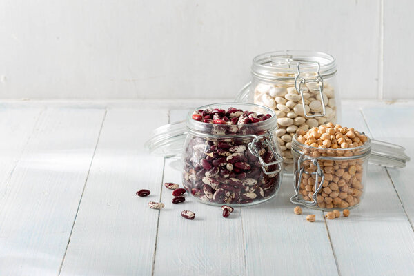 Raw grain bean in a glass jar. Source of protein for a vegetarian