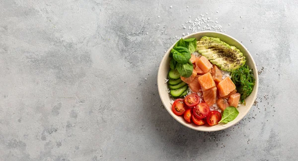 Healthy vegan food concept Poke bowl with salmon, avocado, vegetables and chia seeds