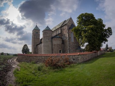 Panoramic view of the Collegiate Church of St. Mary and St. Alexius in Tum, Poland in the summer 2018 clipart
